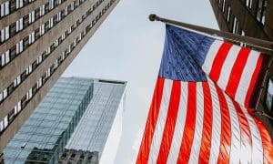 Flag and buildings, corporate taxation, double taxation